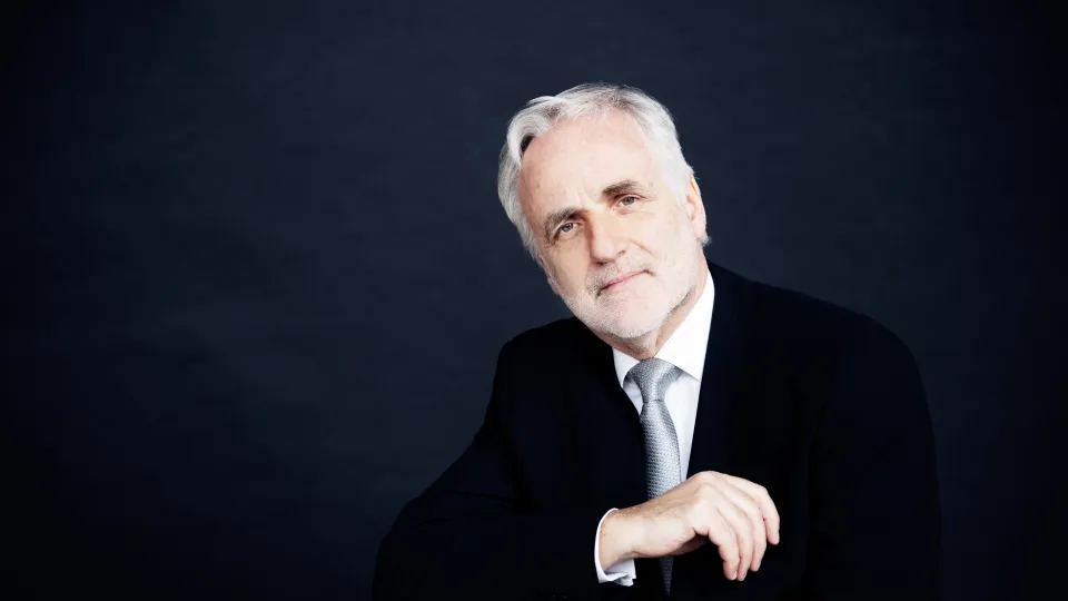 Man in black suit. Photo.